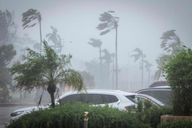 Strong wind brought by Super Typhoon Bavi hits Guam on July 6, 2026. (Photo by Yuichi YAMAZAKI / AFP)