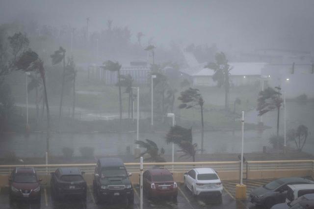Strong wind brought by Super Typhoon Bavi hits Guam on July 6, 2026. (Photo by Yuichi YAMAZAKI / AFP)