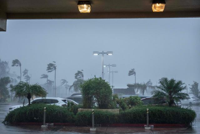 Strong wind brought by Super Typhoon Bavi hits Guam on July 6, 2026. (Photo by Yuichi YAMAZAKI / AFP)