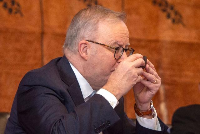 Australian Prime Minister Anthony Albanese drinks traditional kava during a welcome ceremony at the Grand Pacific Hotel in Suva on July 6, 2026. (Photo by Leon LORD / AFP)