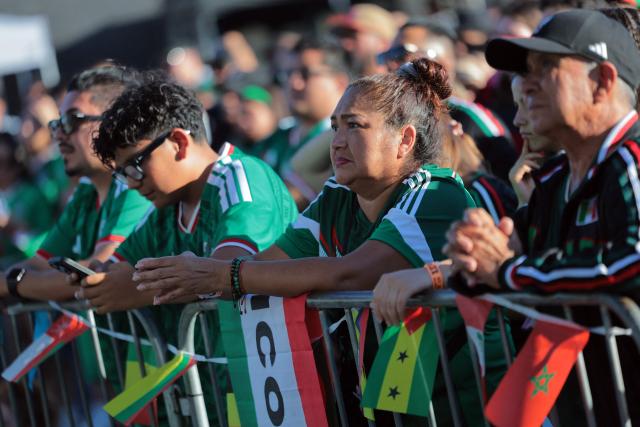 Mexico's fans watch the 2026 World Cup round of 16 football match between the Mexico and England during a watch party at Ace Mission Studios, in Los Angeles, California, on July 5, 2026. (Photo by Etienne LAURENT / AFP)