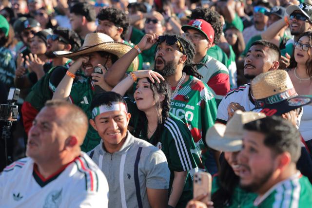 Mexico's fans react after their team missed a chance to score as they watch the 2026 World Cup round of 16 football match between the Mexico and England during a watch party at Ace Mission Studios, in Los Angeles, California, on July 5, 2026. (Photo by Etienne LAURENT / AFP)