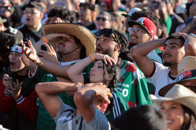Mexico's fans react after their team missed a chance to score as they watch the 2026 World Cup round of 16 football match between the Mexico and England during a watch party at Ace Mission Studios, in Los Angeles, California, on July 5, 2026. (Photo by Etienne LAURENT / AFP)