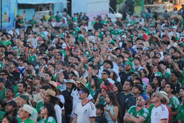 Mexico fans watch the 2026 World Cup round of 16 football match between the Mexico and England during a watch party at Ace Mission Studios, in Los Angeles, California, on July 5, 2026. (Photo by Etienne LAURENT / AFP)