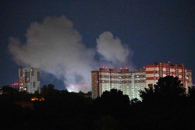 Smoke from an explosion rises during a Russian missile strike on the Ukrainian capital of Kyiv on July 6, 2026, amid the Russian invasion in Ukraine. Russian strikes on Kyiv killed three people on July 6, authorities said, the second deadly attack on the Ukrainian capital in less than a week. (Photo by Sergei SUPINSKY / AFP)