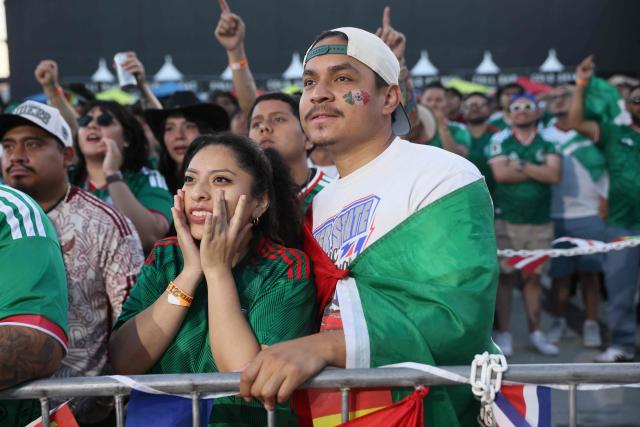 Mexico's fans watch the 2026 World Cup round of 16 football match between the Mexico and England during a watch party at Ace Mission Studios, in Los Angeles, California, on July 5, 2026. (Photo by Etienne Laurent / AFP)