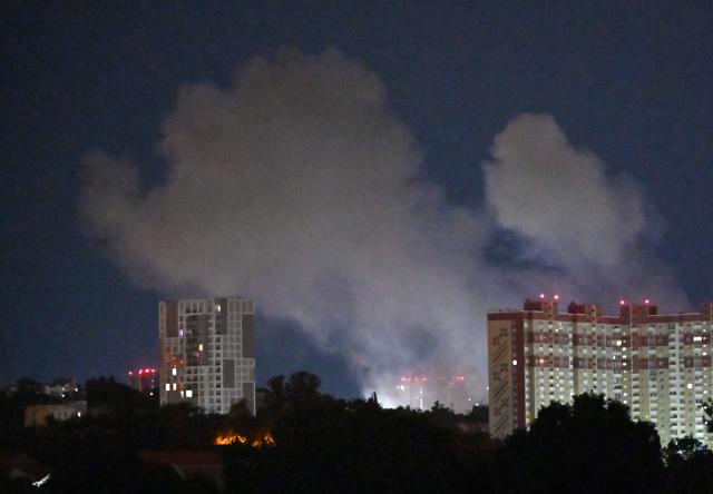Smoke from an explosion rises during a Russian missile strike on the Ukrainian capital of Kyiv on July 6, 2026, amid the Russian invasion in Ukraine. Russian strikes on Kyiv killed three people on July 6, authorities said, the second deadly attack on the Ukrainian capital in less than a week. (Photo by Sergei SUPINSKY / AFP)
