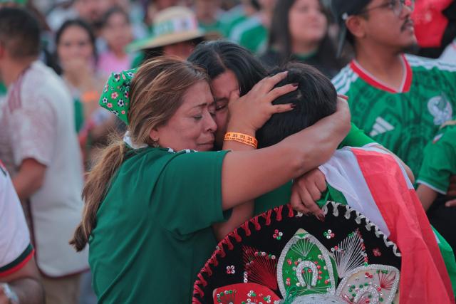 Mexico fans react after their team lost the 2026 World Cup round of 16 football match between the Mexico and England, at a watch party at Ace Mission Studios, in Los Angeles, California, on July 5, 2026. (Photo by Etienne LAURENT / AFP)