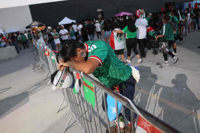 A Mexico fan reacts after their team lost the 2026 World Cup round of 16 football match between the Mexico and England, at a watch party at Ace Mission Studios, in Los Angeles, California, on July 5, 2026. (Photo by Etienne Laurent / AFP)