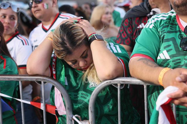 A Mexico fan reacts after their team lost the 2026 World Cup round of 16 football match between the Mexico and England, at a watch party at Ace Mission Studios, in Los Angeles, California, on July 5, 2026. (Photo by Etienne Laurent / AFP)
