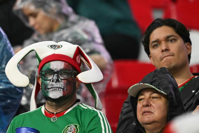 Mexican fans react after losing the 2026 World Cup round of 16 football match between Mexico and England at the Mexico City Stadium in Mexico City on July 5, 2026.  (Photo by Yuri CORTEZ / AFP)
