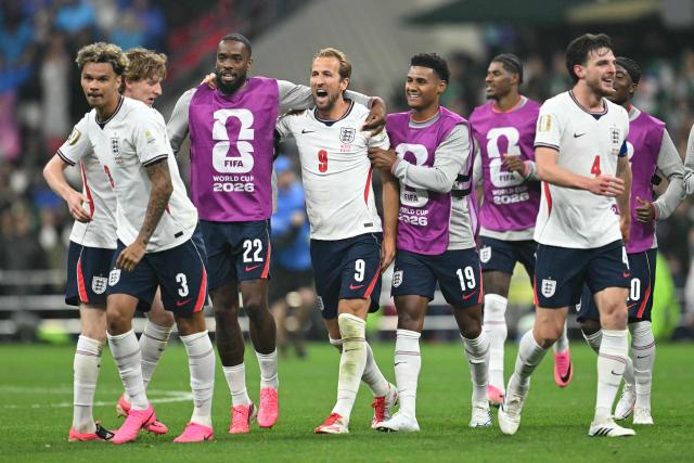 England's players celebrate after winning the 2026 World Cup round of 16 football match between Mexico and England at the Mexico City Stadium in Mexico City on July 5, 2026.  (Photo by Yuri CORTEZ / AFP)