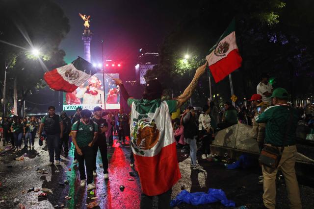 Mexican football fans react after the 2026 FIFA World Cup Round of 16 football match between Mexico and England at the Angel of Independence in Mexico City on July 5, 2026. (Photo by Claudia Rosel / AFP)