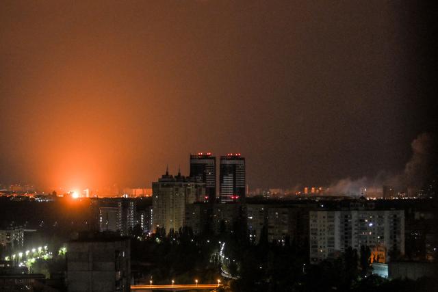This photograph shows an explosion during a Russian missile strike on the Ukrainian capital of Kyiv on July 6, 2026, amid the Russian invasion in Ukraine. Russia struck Ukraine's Kyiv region with ballistic missiles on July 6, killing at least eight people and wounding dozens, authorities said, on the eve of a NATO summit in Turkey. (Photo by Eugene KOTENKO / AFP)