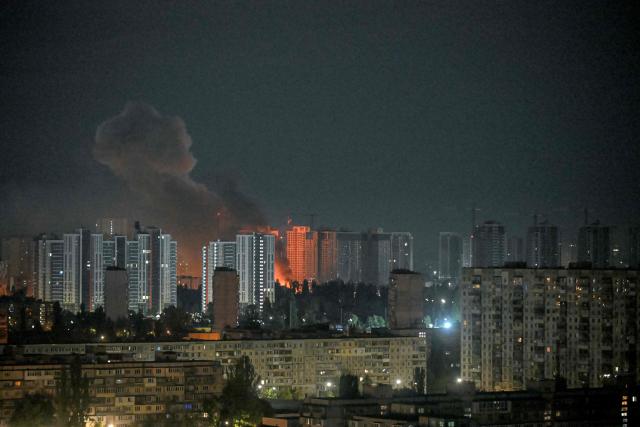 This photograph shows a fire after an explosion during a Russian missile strike on the Ukrainian capital of Kyiv on July 6, 2026, amid the Russian invasion in Ukraine. Russia struck Ukraine's Kyiv region with ballistic missiles on July 6, killing at least eight people and wounding dozens, authorities said, on the eve of a NATO summit in Turkey. (Photo by Eugene KOTENKO / AFP)