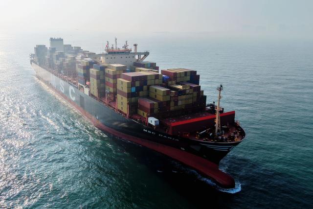 A cargo ship sails out of the port in Qingdao, in China’s eastern Shandong province on July 5, 2026. (Photo by CN-STR / AFP) / China OUT