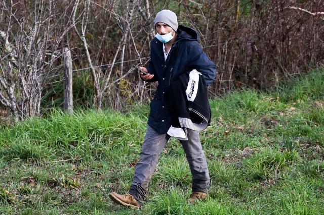 (FILES) Cedric Jubillar, husband of the missing woman Delphine Jubillar, takes part in a search organised by French gendarmes in the woods of Milhars, on December 23, 2020, to look for his wife who disappeared since December 15, in Cagnac, les Mines near Albi, southern France. Cedric Jubillar admitted to having killed his wife Delphine, who had been missing in the Tarn since late 2020, in a letter sent to his lawyer. (Photo by Fred SCHEIBER / AFP)