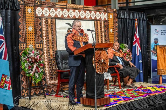 Australian Prime Minister Anthony Albanese (L) and Fiji Minister for Public Works, Transport and Meteorological Services Ro Filipe Tuisawau (R) attend the opening of the Vuvale Skills hub in Suva on July 6, 2026. Australia signed a new defence alliance with Fiji on July 6, bolstering ties with its South Pacific island neighbor as it seeks to outmanoeuvre China in the region. (Photo by LEON LORD / AFP)