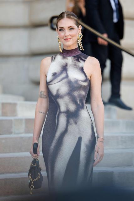Italian influencer Chiara Ferragni arrives for the Schiaparelli Women Haute Couture Fall/Winter 2026-2027 collection as part of the Paris Fashion Week, in Paris, on July 6, 2026. (Photo by GEOFFROY VAN DER HASSELT / AFP)