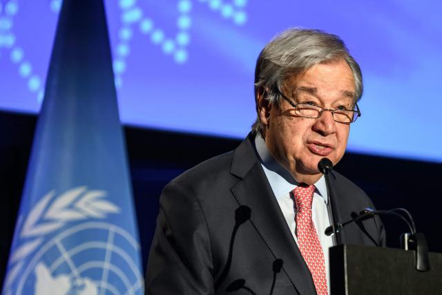 UN Secretary-General Antonio Guterres delivers the opening speech of the first Global Dialogue on AI Governance, in Geneva on July 6, 2026. Guterres called for a global governance system to shape artificial intelligence for the good of humanity, warning against allowing the technology itself to "vibe-code" our future.  (Photo by Fabrice COFFRINI / AFP)