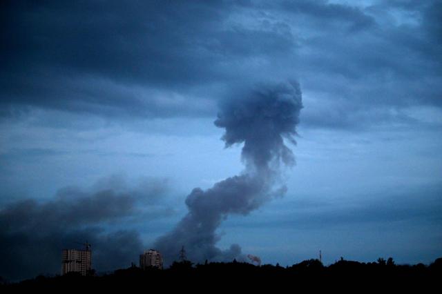 This photograph shows smoke rising during Russian missile strikes on the Ukrainian capital of Kyiv on July 6, 2026, amid the Russian invasion in Ukraine. Russia fired missiles and drones into apartment buildings in Kyiv for the second time in a week on Monday morning, killing at least 14 people on the eve of a crucial NATO summit, authorities said. (Photo by Sergei SUPINSKY / AFP)