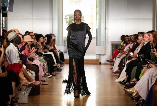 A model presents a creation by Imane Ayissi for the Women Haute Couture Fall/Winter 2026-2027 collection as part of the Paris Fashion Week, in Paris, on July 6, 2026. (Photo by Thomas SAMSON / AFP)