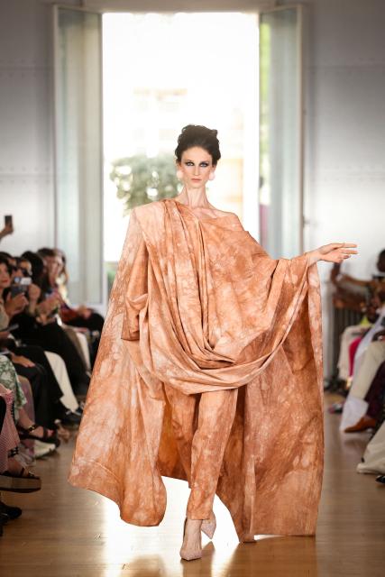 A model presents a creation by Imane Ayissi for the Women Haute Couture Fall/Winter 2026-2027 collection as part of the Paris Fashion Week, in Paris, on July 6, 2026. (Photo by Thomas SAMSON / AFP)