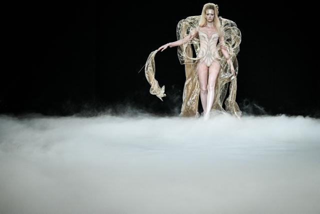 A model presents a creation by Iris Van Herpen for the Women Haute Couture Fall/Winter 2026-2027 collection as part of the Paris Fashion Week, in Paris, on July 6, 2026. (Photo by Blanca CRUZ / AFP)