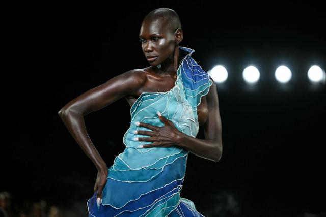 A model presents a creation by Iris Van Herpen for the Women Haute Couture Fall/Winter 2026-2027 collection as part of the Paris Fashion Week, in Paris, on July 6, 2026. (Photo by Blanca CRUZ / AFP)