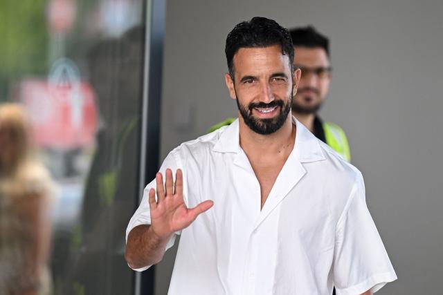 Italian football club AC Milan's newly recruited Portuguese coach Ruben Amorim waves upon his arrival at Linate Airport in Milan on July 6, 2026. (Photo by Piero CRUCIATTI / AFP)