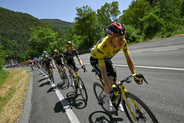 Team Visma | Lease a Bike's Danish rider Jonas Vingegaard wearing the overall leader's yellow jersey cycles during the 3rd stage of the 113th edition of the Tour de France cycling race, 195,9 km between Granollers in Spain and Les Angles in southern France, on July 6, 2026. (Photo by Loic VENANCE / AFP)