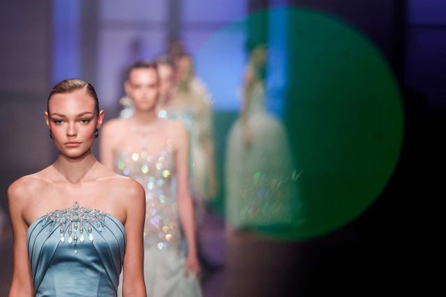 Models present creations by Georges Hobeika for the Women Haute Couture Fall/Winter 2026-2027 collection as part of the Paris Fashion Week, in Paris, on July 6, 2026. (Photo by GEOFFROY VAN DER HASSELT / AFP)