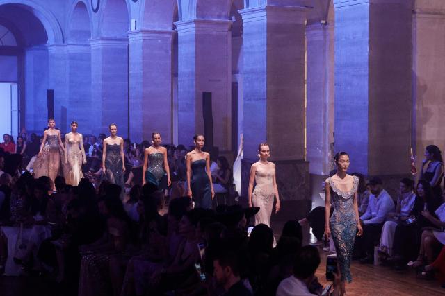 Models present creations by Georges Hobeika for the Women Haute Couture Fall/Winter 2026-2027 collection as part of the Paris Fashion Week, in Paris, on July 6, 2026. (Photo by GEOFFROY VAN DER HASSELT / AFP)