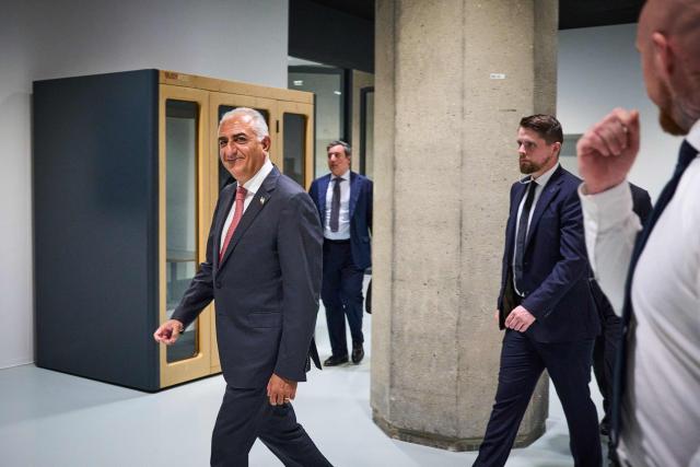 Son of Iran's last shah, opposition figure Prince Reza PahlaviReza Pahlavi (L) arrives at the Dutch parliament to take part in a roundtable discussion regarding the situation in Iran, in The Hague on July 6, 2026. (Photo by Phil Nijhuis / ANP / AFP) / Netherlands OUT