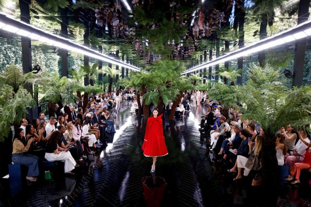 A model presents a creation for Christian Dior for the Women Haute Couture Fall/Winter 2026-2027 collection as part of the Paris Fashion Week, in Paris, on July 6, 2026. (Photo by Kenzo TRIBOUILLARD / AFP)