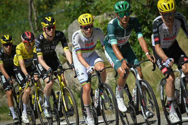 (From L) Team Visma | Lease a Bike's Danish rider Jonas Vingegaard wearing the overall leader's yellow jersey, Team Visma | Lease a Bike's US rider Matteo Jorgenson, UAE Team Emirates - XRG's Slovenian rider Tadej Pogacar, UAE Team Emirates - XRG's Mexican rider Isaac Del Toro wearing the sprinter's green jersey and UAE Team Emirates - XRG's British rider Adam Yates cycle with the pack of riders (peloton) during the 3rd stage of the 113th edition of the Tour de France cycling race, 195,9 km between Granollers in Spain and Les Angles in southern France, on July 6, 2026. (Photo by Loic VENANCE / AFP)