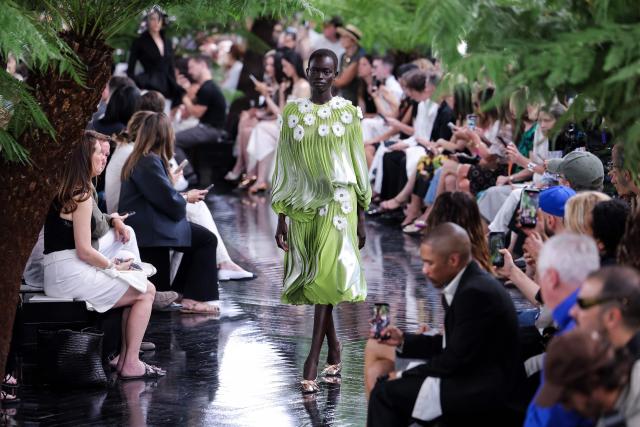 A model presents a creation for Christian Dior for the Women Haute Couture Fall/Winter 2026-2027 collection as part of the Paris Fashion Week, in Paris, on July 6, 2026. (Photo by Kenzo TRIBOUILLARD / AFP)