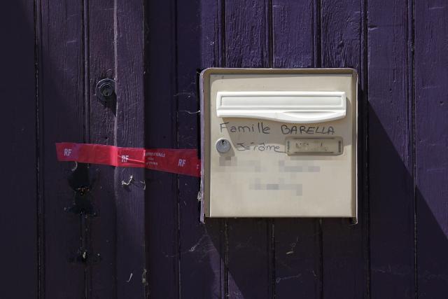 This photograph shows a view of the Jerome Barella's mailbox with a red seal tape of the Gendarmerie Nationale amid a search conducted at the home of murder suspect Jerome Barella in Montestruc-sur-Gers, southwestern France, on July 6, 2026, as part of the investigation into the disappearance and death of 11-year-old Lyhanna. The death and rape of Lyhanna, an 11-year-old middle school student who went missing in late May before being found dead on June 4 in the Gers, has stirred a wave of anger and emotion across the country, with an inspection mission concluding there were failures in the justice system. (Photo by Valentine CHAPUIS / AFP)