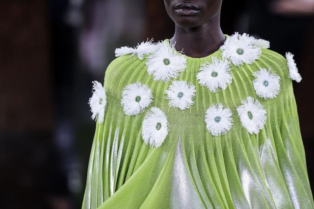 A model presents a creation for Christian Dior for the Women Haute Couture Fall/Winter 2026-2027 collection as part of the Paris Fashion Week, in Paris, on July 6, 2026. (Photo by Kenzo TRIBOUILLARD / AFP)