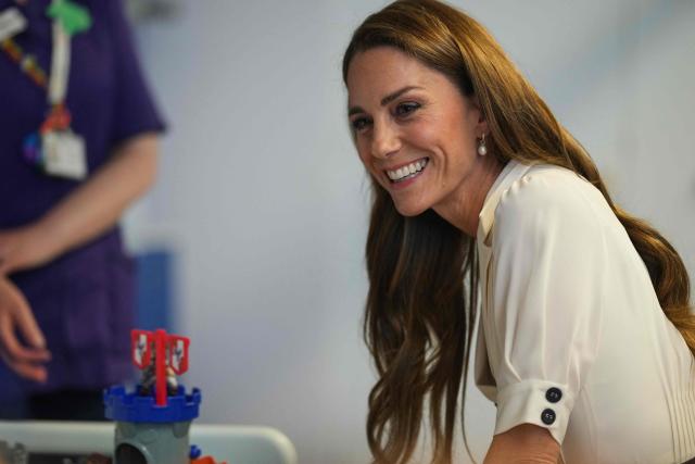 Britain's Catherine, Princess of Wales, speaks to patients and parents as she visits the Evelina London Children's Hospital on July 6, 2026 (Photo by Alastair Grant / POOL / AFP)