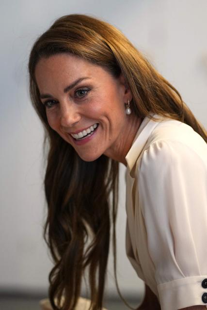 Britain's Catherine, Princess of Wales, speaks to patients and parents as she visits the Evelina London Children's Hospital on July 6, 2026 (Photo by Alastair Grant / POOL / AFP)