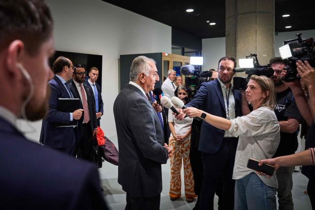 Son of Iran's last shah, opposition figure Prince Reza Pahlavi (C) speaks to the press as he takes part in a roundtable discussion regarding the situation in Iran at the Dutch parliament in The Hague on July 6, 2026. (Photo by Phil Nijhuis / ANP / AFP) / Netherlands OUT