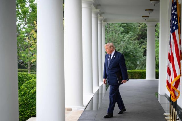 US President Donald Trump walks through the Colonnade to speak during a Rose Garden Club event on the Rose Garden of the White House in Washington, DC, on July 6, 2026. (Photo by Mandel NGAN / AFP)