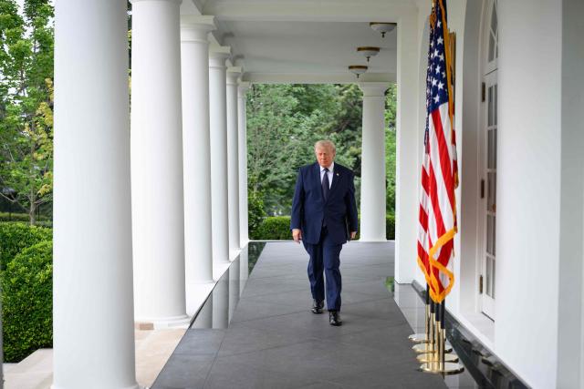 US President Donald Trump walks through the Colonnade to speak during a Rose Garden Club event on the Rose Garden of the White House in Washington, DC, on July 6, 2026. (Photo by Mandel NGAN / AFP)