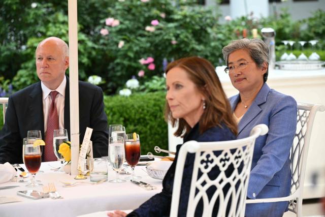 (L-R) Chairperson of Intercontinental Exchange Jeffrey Sprecher, Chair and Chief Executive Officer at Nasdaq Adena Friedman and Advanced Micro Devices (AMD) CEO Lisa Su, attend a Rose Garden Club event on the Rose Garden of the White House in Washington, DC, on July 6, 2026. (Photo by Mandel NGAN / AFP)
