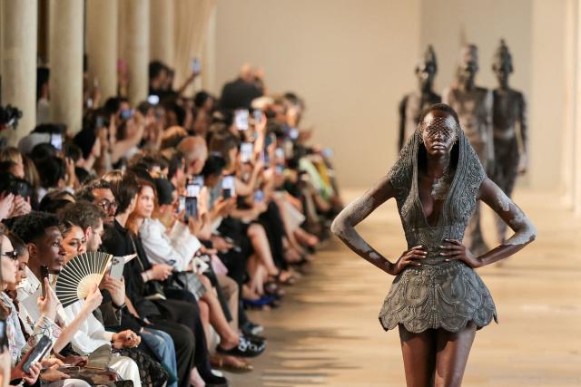 A model presents a creation by Rahul Mishra for the Women Haute Couture Fall/Winter 2026-2027 collection as part of the Paris Fashion Week, in Paris, on July 6, 2026. (Photo by Thomas SAMSON / AFP)