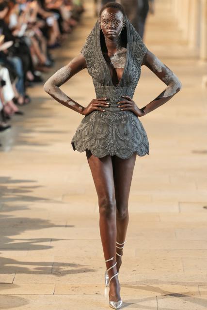 A model presents a creation by Rahul Mishra for the Women Haute Couture Fall/Winter 2026-2027 collection as part of the Paris Fashion Week, in Paris, on July 6, 2026. (Photo by Thomas SAMSON / AFP)