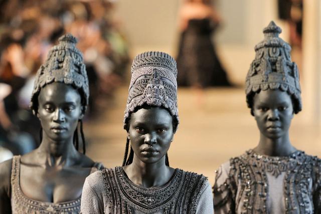 Models present creations by Rahul Mishra for the Women Haute Couture Fall/Winter 2026-2027 collection as part of the Paris Fashion Week, in Paris, on July 6, 2026. (Photo by Thomas SAMSON / AFP)