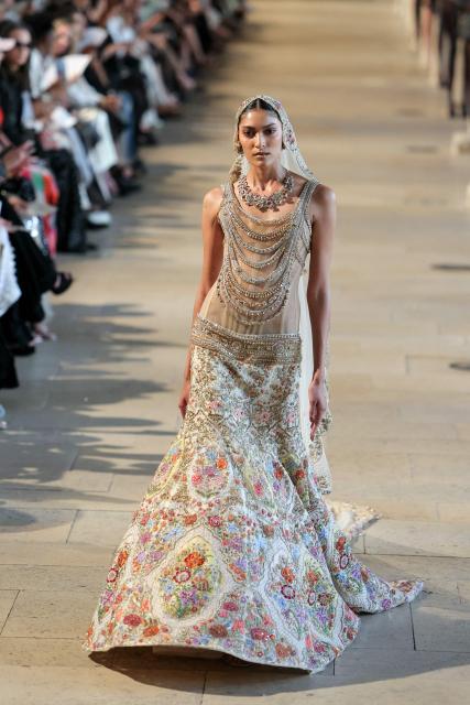 US model Pritika Swarup presents a creation by Rahul Mishra for the Women Haute Couture Fall/Winter 2026-2027 collection as part of the Paris Fashion Week, in Paris, on July 6, 2026. (Photo by Thomas SAMSON / AFP)