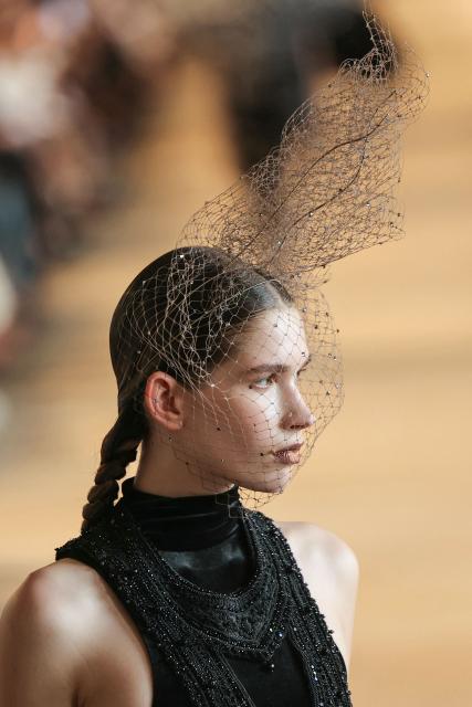 A model presents a creation by Rahul Mishra for the Women Haute Couture Fall/Winter 2026-2027 collection as part of the Paris Fashion Week, in Paris, on July 6, 2026. (Photo by Thomas SAMSON / AFP)